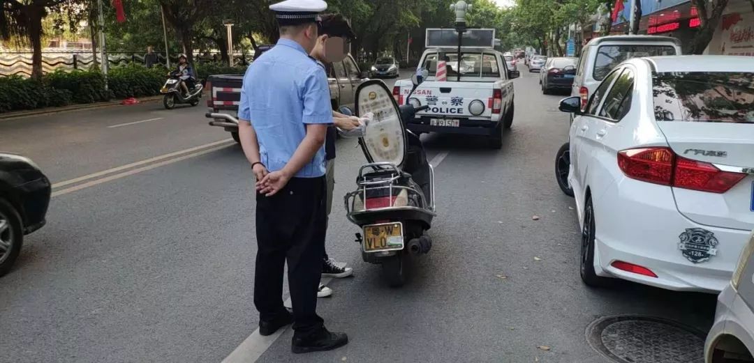 摩托车挡车牌怎么处罚 摩托车挡车牌怎么处罚的